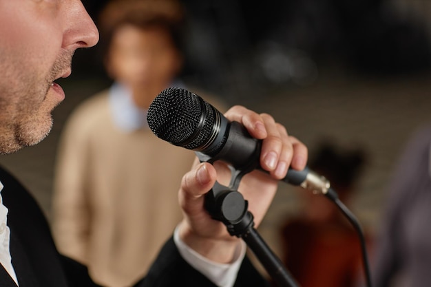 Pastor speaking in microphone in church