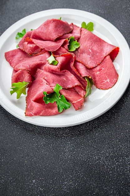 pastrami meat fresh veal juicy beef meal food snack on the table copy space food background rustic