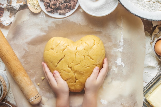 Pastry, cakes, cook their own hands. Selective focus.