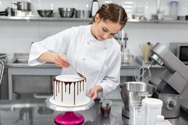 Pastry chef cooking in the kitchen