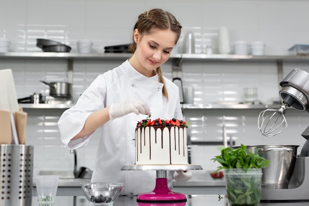 Pastry chef cooking in the kitchen