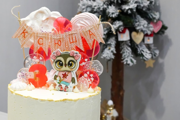 The pastry chef made a creamy cake and baked pastries on fresh food decorations for a birthday cake