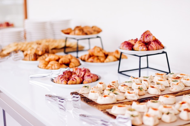 Pastry cookies and croissants sweet desserts served at charity event  food drinks and menu concept as holiday background banner for luxury brand design