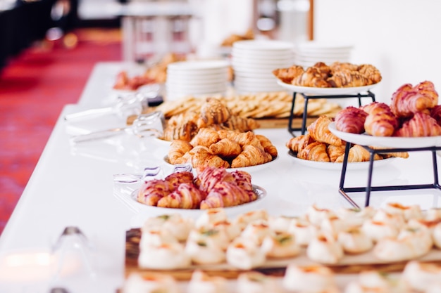 Pastry cookies and croissants sweet desserts served at charity event  food drinks and menu concept as holiday background banner for luxury brand design