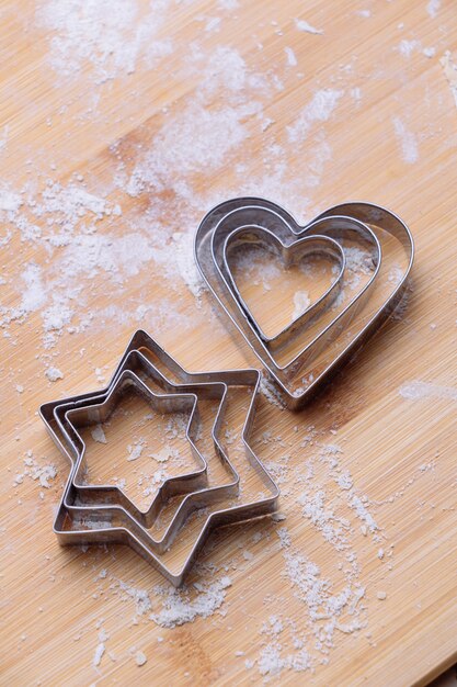 Pastry cutter on wooden board