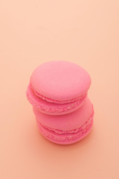 Pastry pink round shape on a pink background