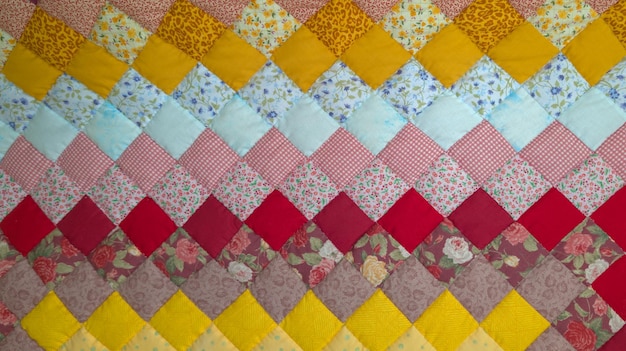 Patchwork style quilted quilt in geometrical pattern