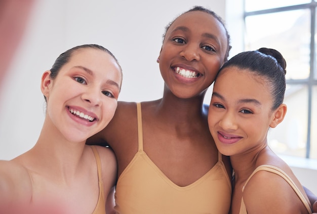 A path danced together Portrait of a group of ballet dancers taking a selfie together