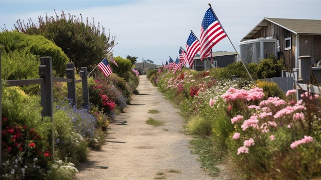 A path with flags and flowers along the side of a house