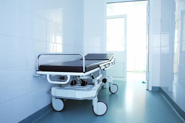 Patient bed in hospital hallway