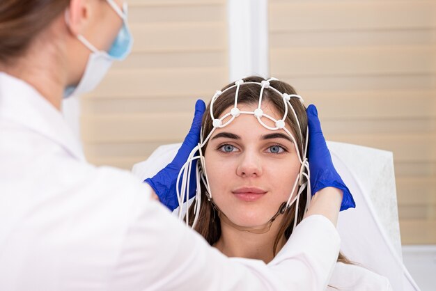 Patient brain testing using encephalography at medical center