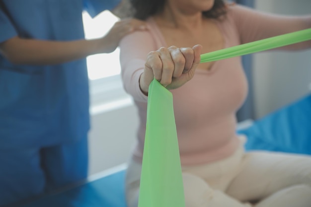 Patient doing some special exercises under supervision in a room