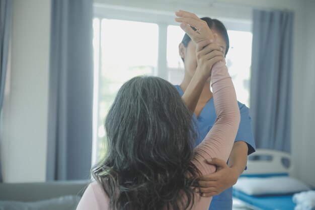 Patient doing some special exercises under supervision in a room