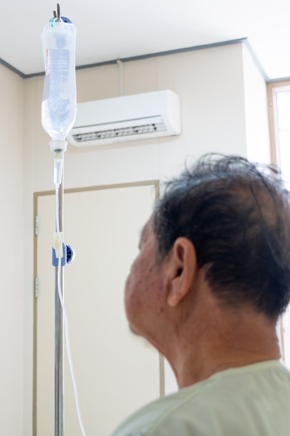 Patient in a hospital with saline intravenous