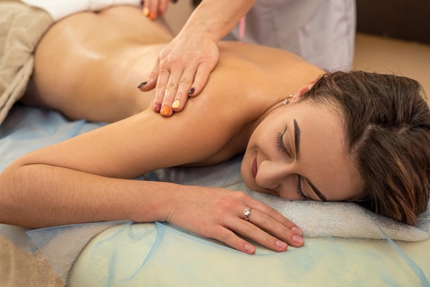 The patient is being treated by a professional therapist with beautiful hands