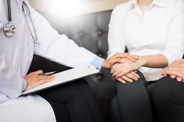 patient listening intently to a male doctor 