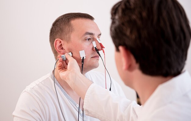 Patient nerves testing using electromyography at medical center