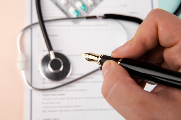 Patient signing a document