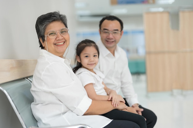 The patient sits and waits for the whole family's health