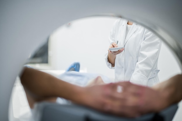 Patient undergoing the MRI investigation in the medical center