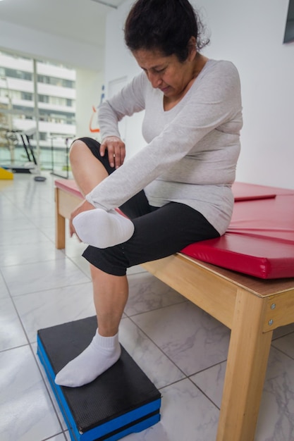 Patient undergoing rehabilitation therapy in a medical center