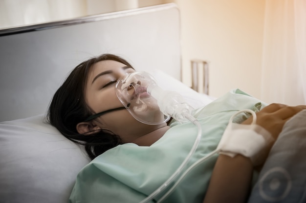 Patients suffering from unconsciousness during treatment, resting in patient bed.