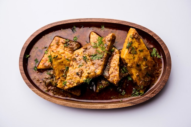 Patodi Rassa Bhaji or patwadi Sabji, a popular Maharashtrian spicy recipe served with Chapati and salad. Selective focus