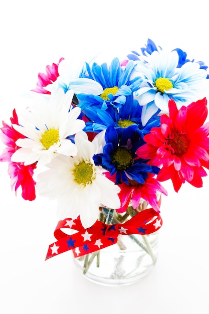 Patriotic holiday bouques with daisies for July 4th.