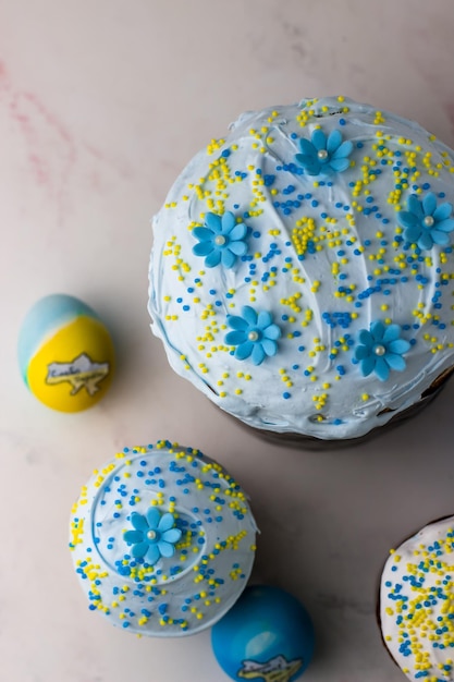 Patriotic paska and eggs in the colors of the flag of Ukraine Blue and yellow eggs