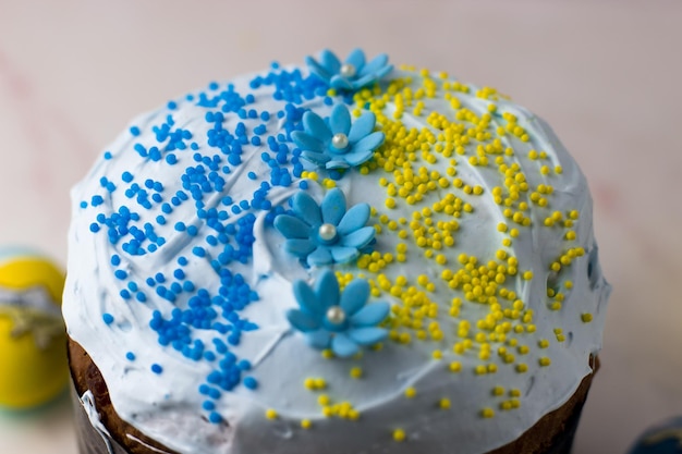 Patriotic paska and eggs in the colors of the flag of Ukraine Blue and yellow eggs