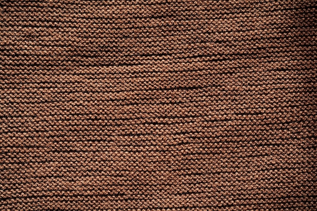 Patroon van de achtergrond van de textuur van bruin gebreide wol