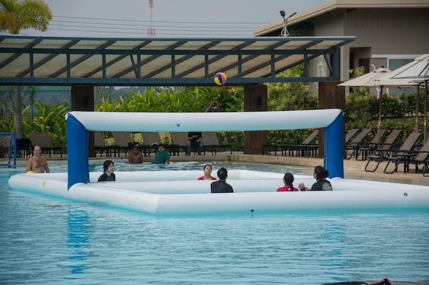 PATTAYA THAILAND NOVEMBER 12 2017 People play volleyball in the water pool at RamaYana Water Park New recreation in Pattaya Thailand