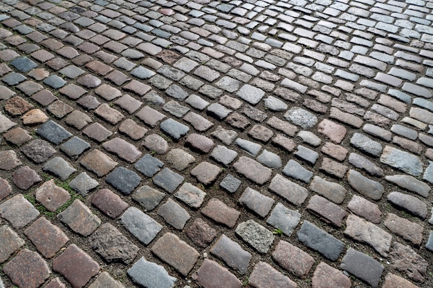 Pattern of ancient german cobblestone in city downtown. 