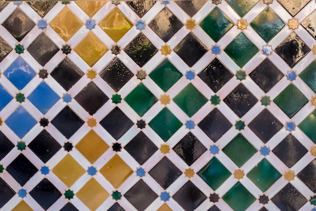 Pattern of antique arabic tiles in Alhambra