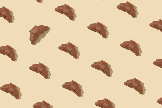 Pattern baking brown croissants for breakfast or dessert 3d polygon minimal concept pastel