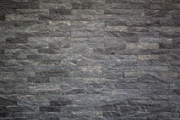 Photo pattern of black slate wall texture and background