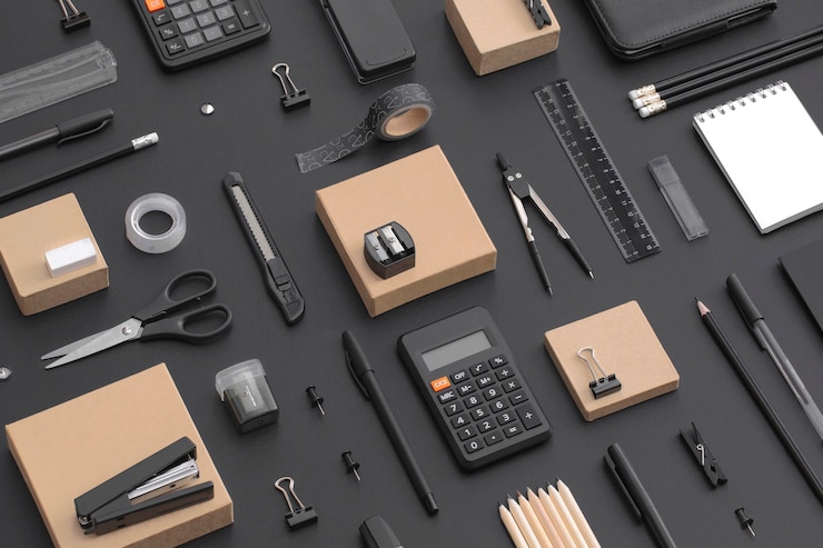 Photo pattern composition of office and school stationery on black leather background. back to school
