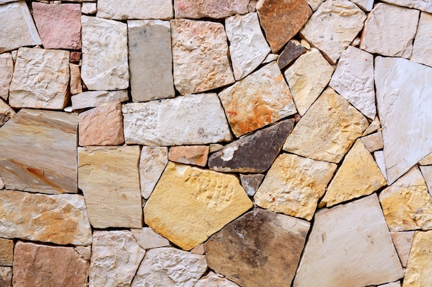 Pattern of decorative colorful stone wall background