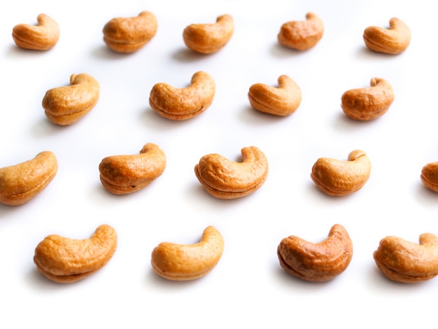 Pattern of dried cashew nuts isolated.