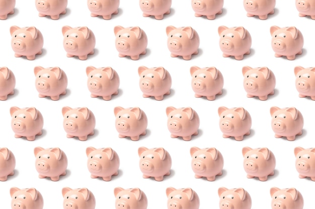 Pattern from a pink piggy bank on a white background.