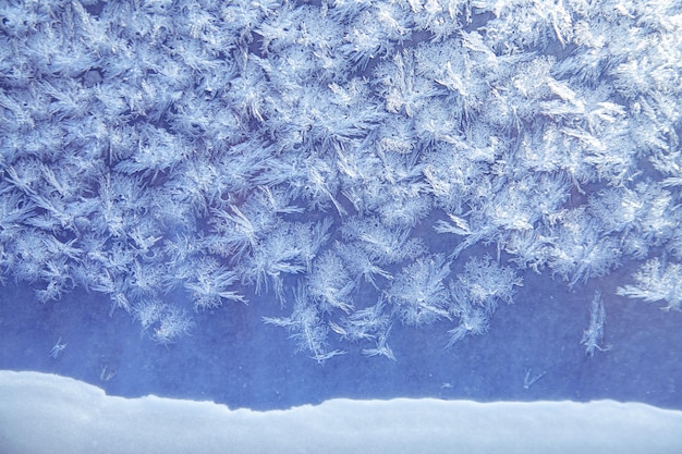 Schema di ghiaccio sul vetro della finestra bellezza della natura textura di ghiaccio