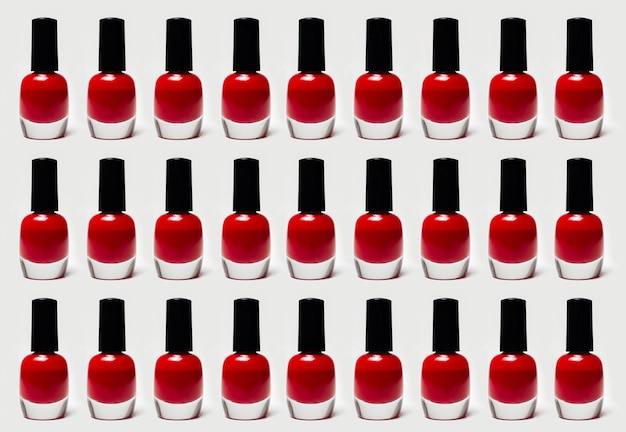 Pattern of glitter nail polish of red color isolated on white background