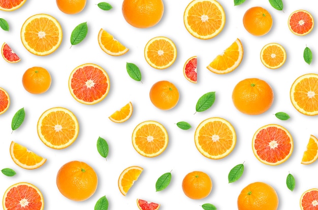 Pattern of an orange citrus slices on white background