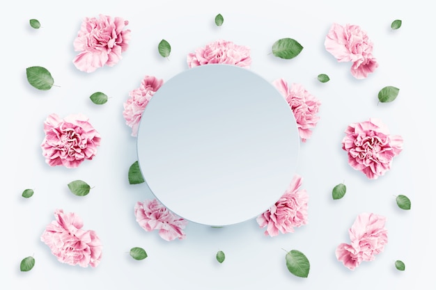 Pattern of pink and beige roses and green leaves on a white background