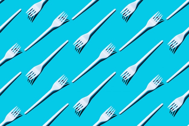 Photo pattern of white plastic disposable forks