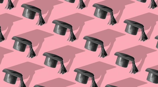 Pattern with black graduated cap pink background with hard shadow Education background