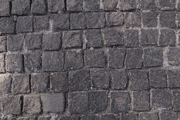 Pavement texture. Old paving stone mosaic pattern.