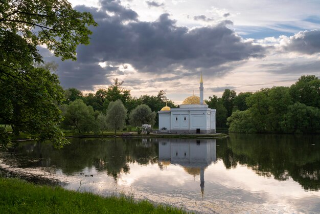 The pavilion of the Turkish Bath on the shore of a Large pond in the Catherine Park in Tsarskoye Selo on a sunny summer day Pushkin St Petersburg Russia