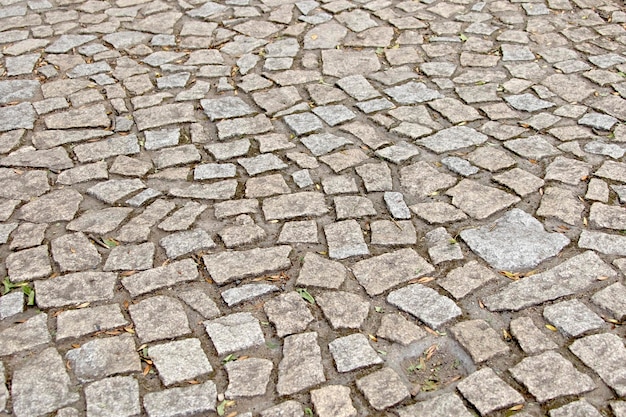 Paving blocks made of asymmetrical stone