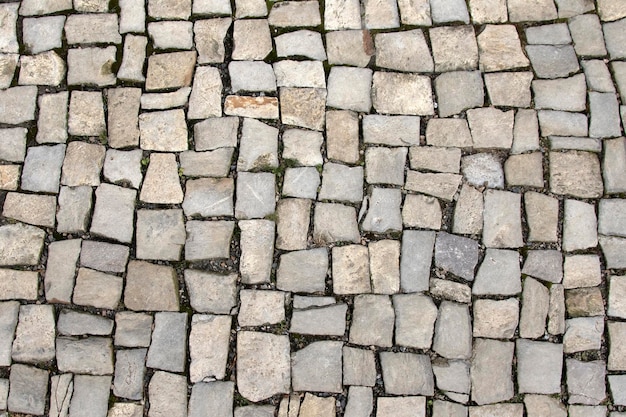 Paving blocks made of asymmetrical stone